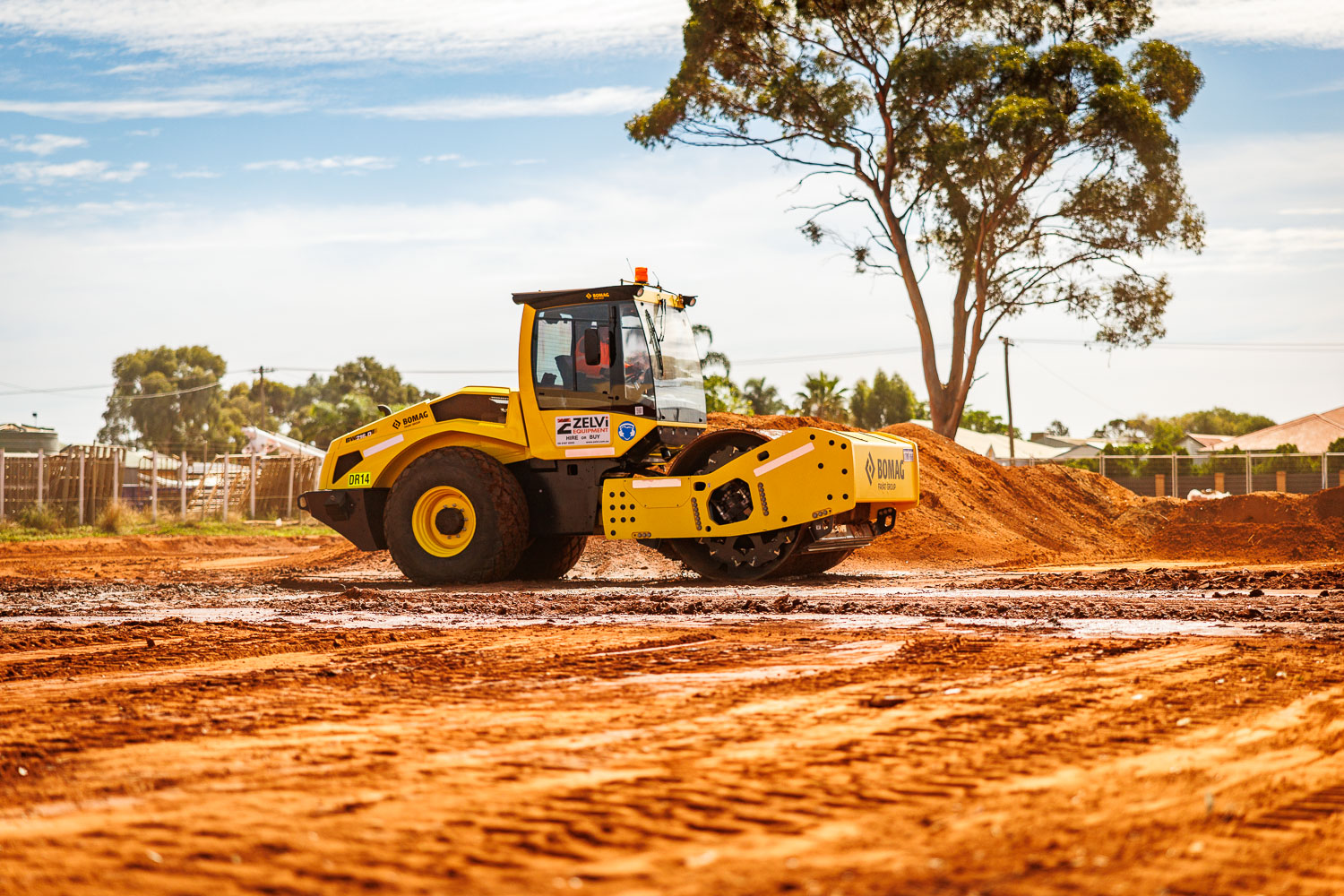 Bomag roller compacting a commercial earthworks site