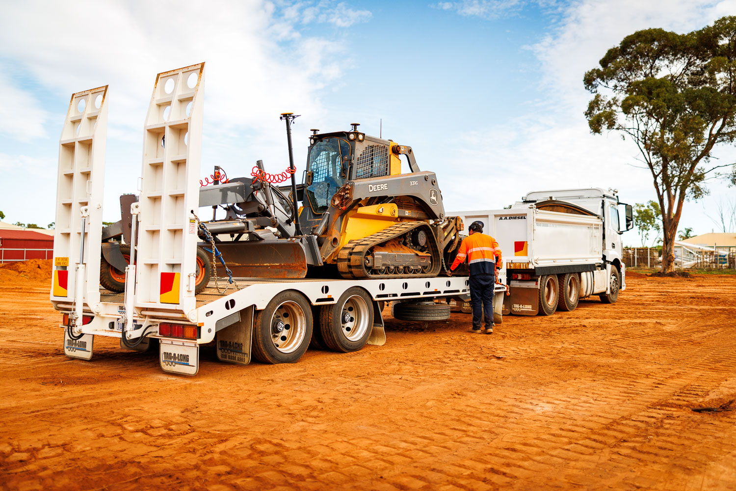 GEMS Civil tag-along trailer with CTL loaded, ready for transport