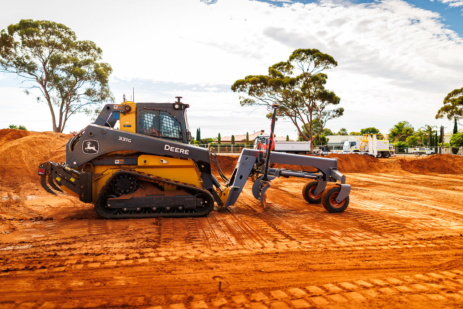 John Deere 331G with rear ripper and grade control for underground works
